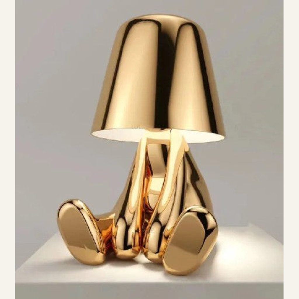 Gold thinker statue table lamp seated pose