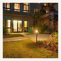 Solar flame-effect torch installed in a residential garden