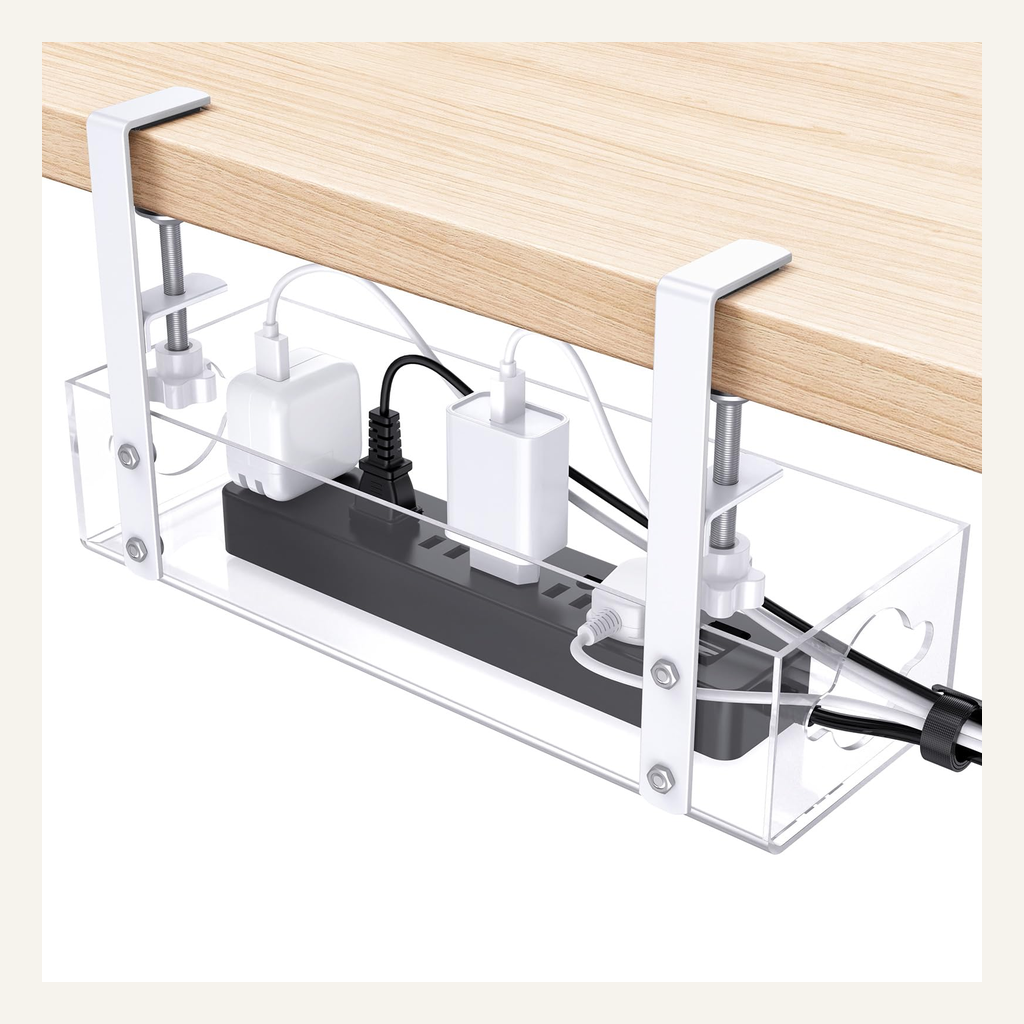 Clear clamp-on under-desk cable tray installed with power accessories