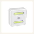 White motion-sensor cabinet light full product view