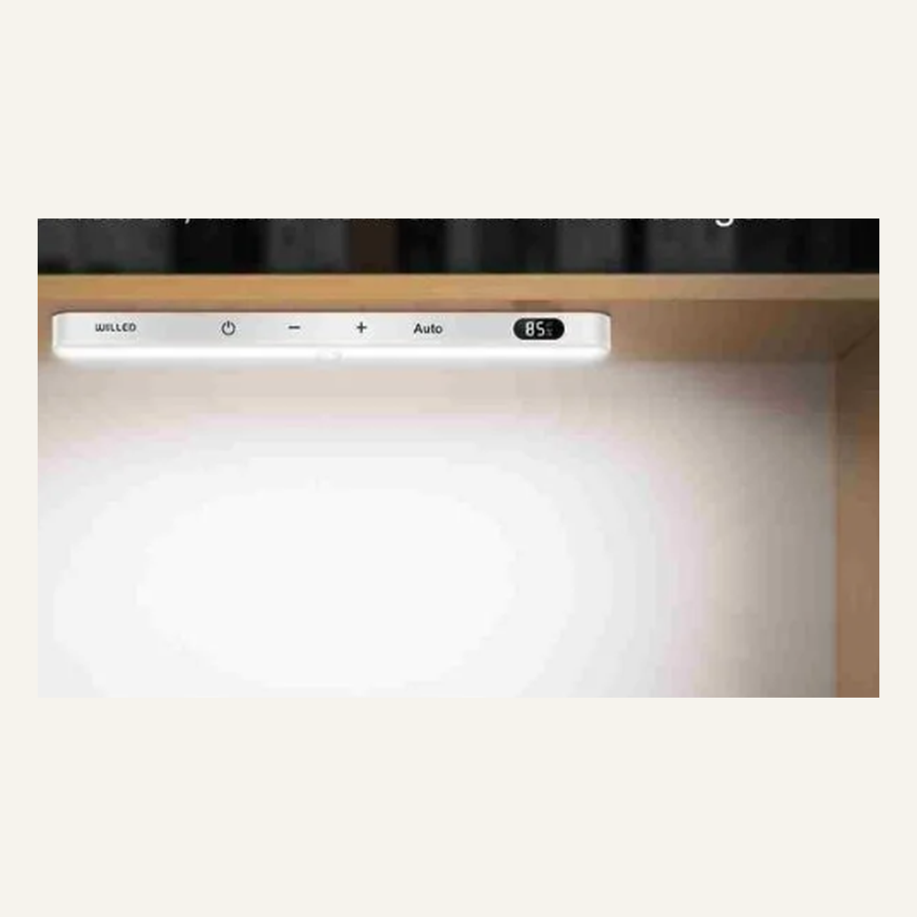 White cabinet light installed under a shelf