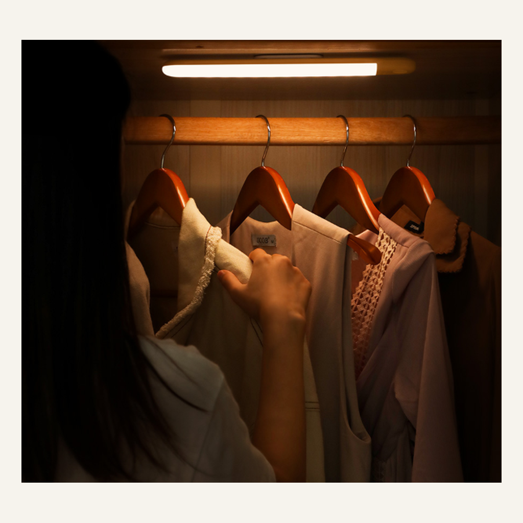 LED closet light bar installed inside a wardrobe