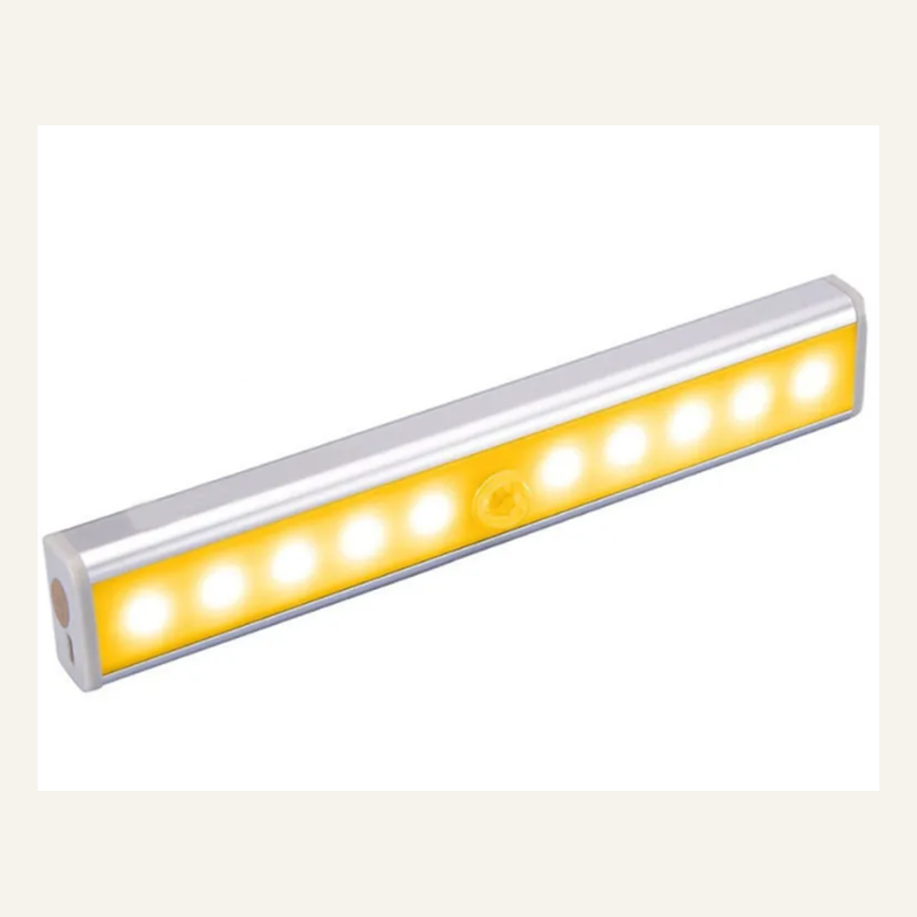 Silver rechargeable cabinet light illuminated in warm light
