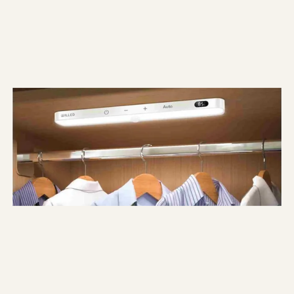 White cabinet light installed inside a closet