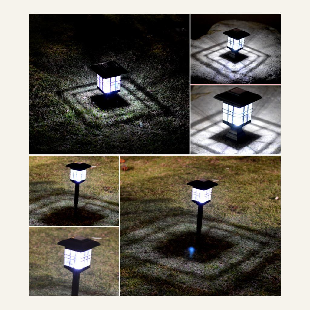 Black solar pillar light illuminated in outdoor settings