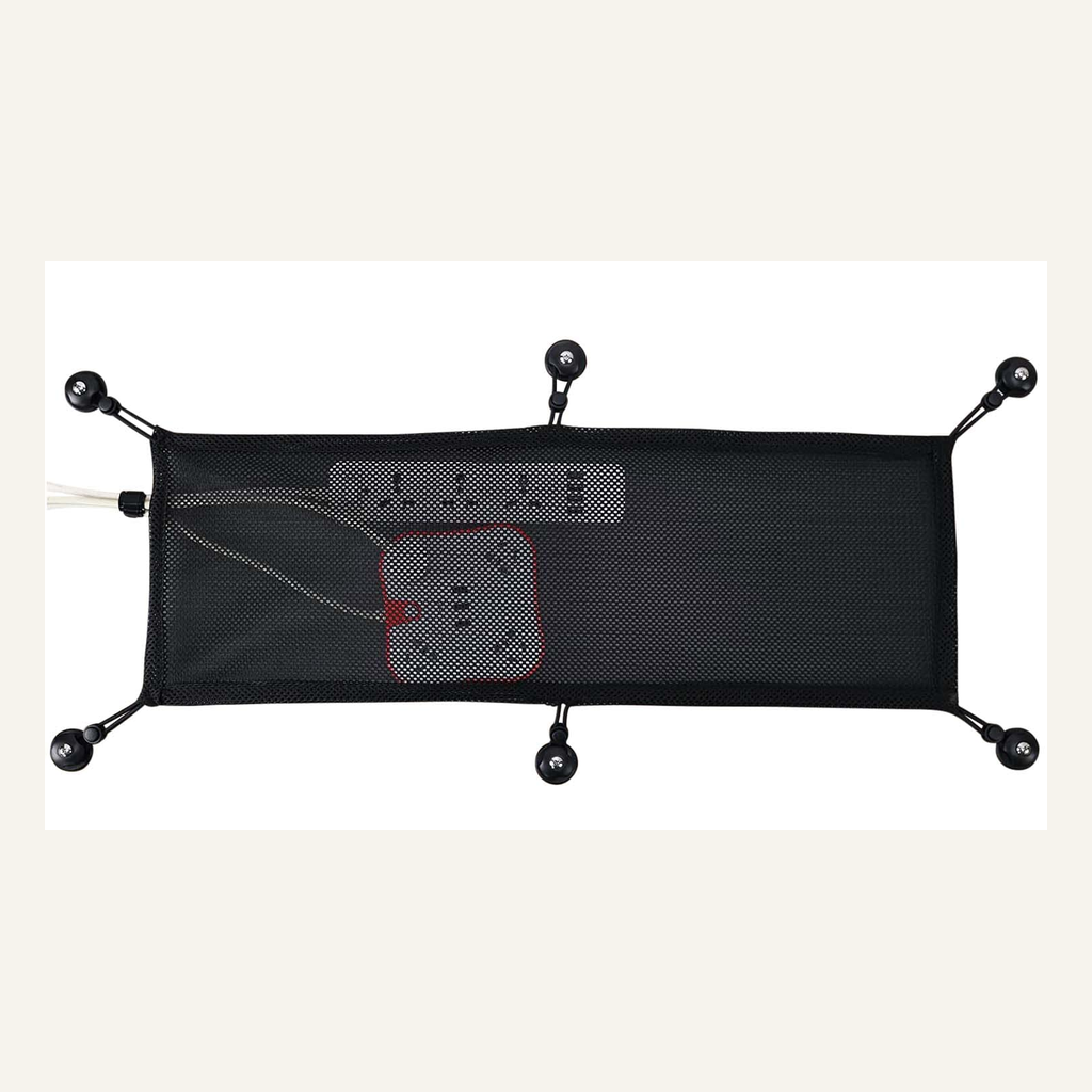 Black under-desk cable net shown holding power accessories