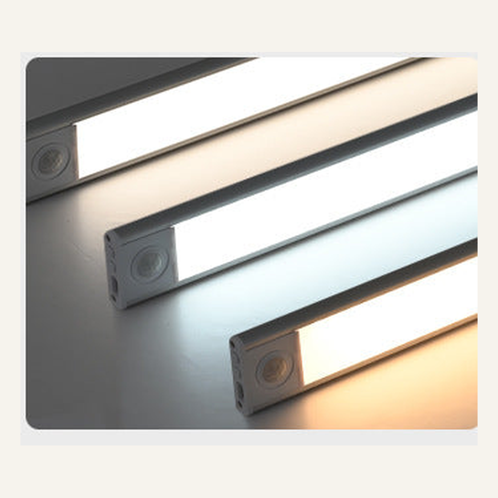 Silver 30 cm cabinet light bars installed under a shelf