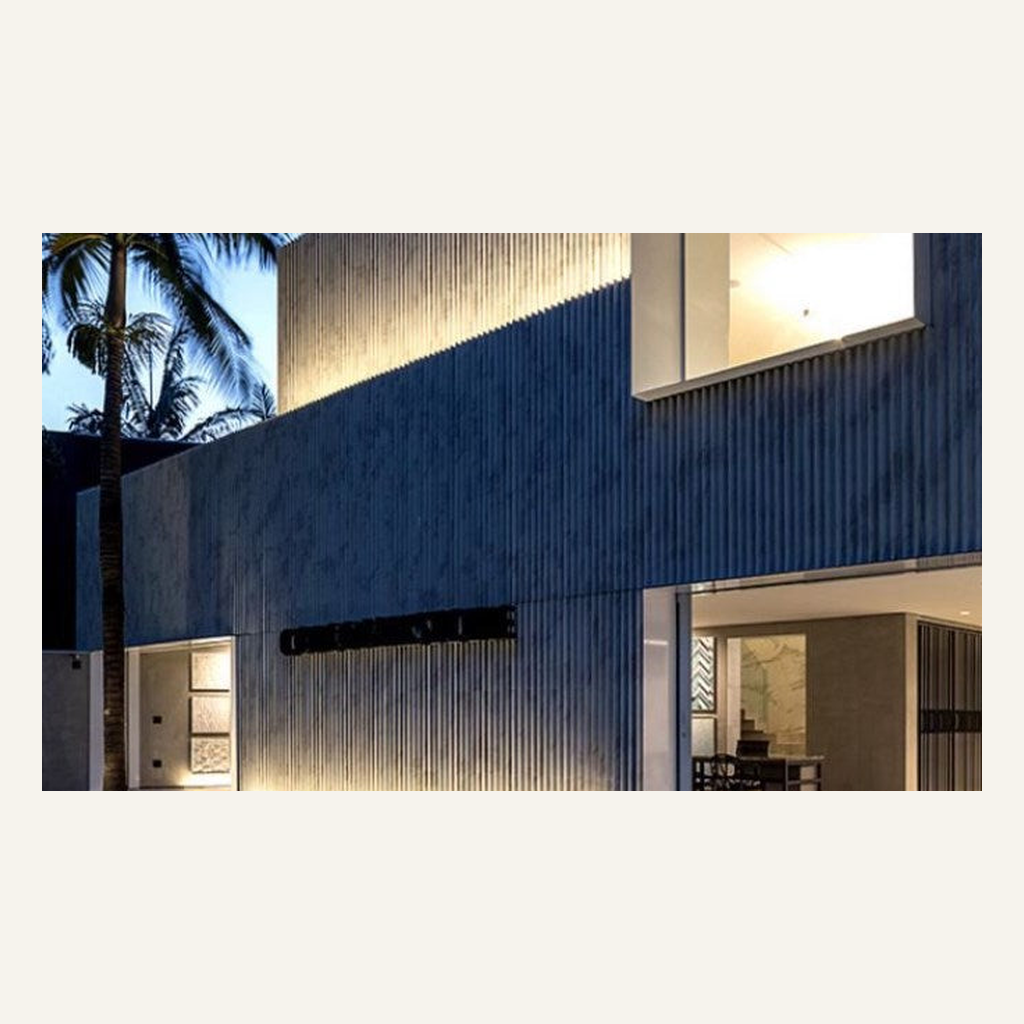 Warm-white LED wall washer installed on a modern exterior