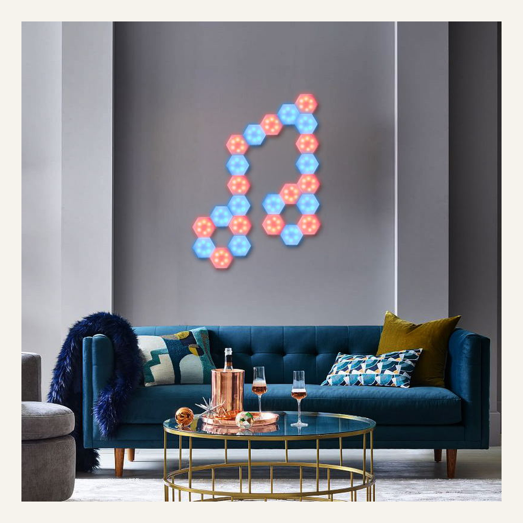 Modular hexagonal LED wall lights in a living room