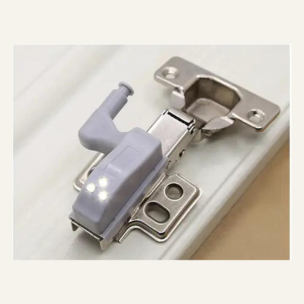 Cabinet hinge LED light installed on hinge hardware