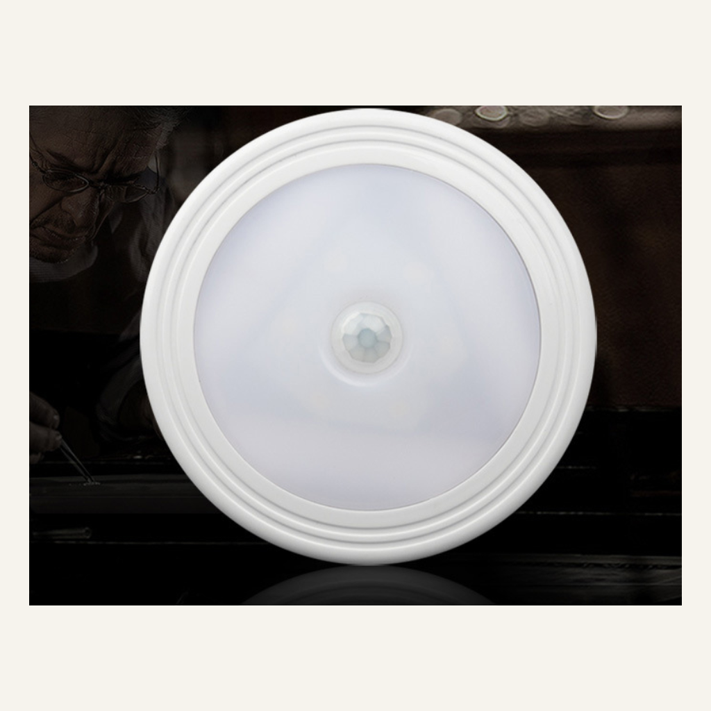 Round motion sensor closet light illuminated front detail