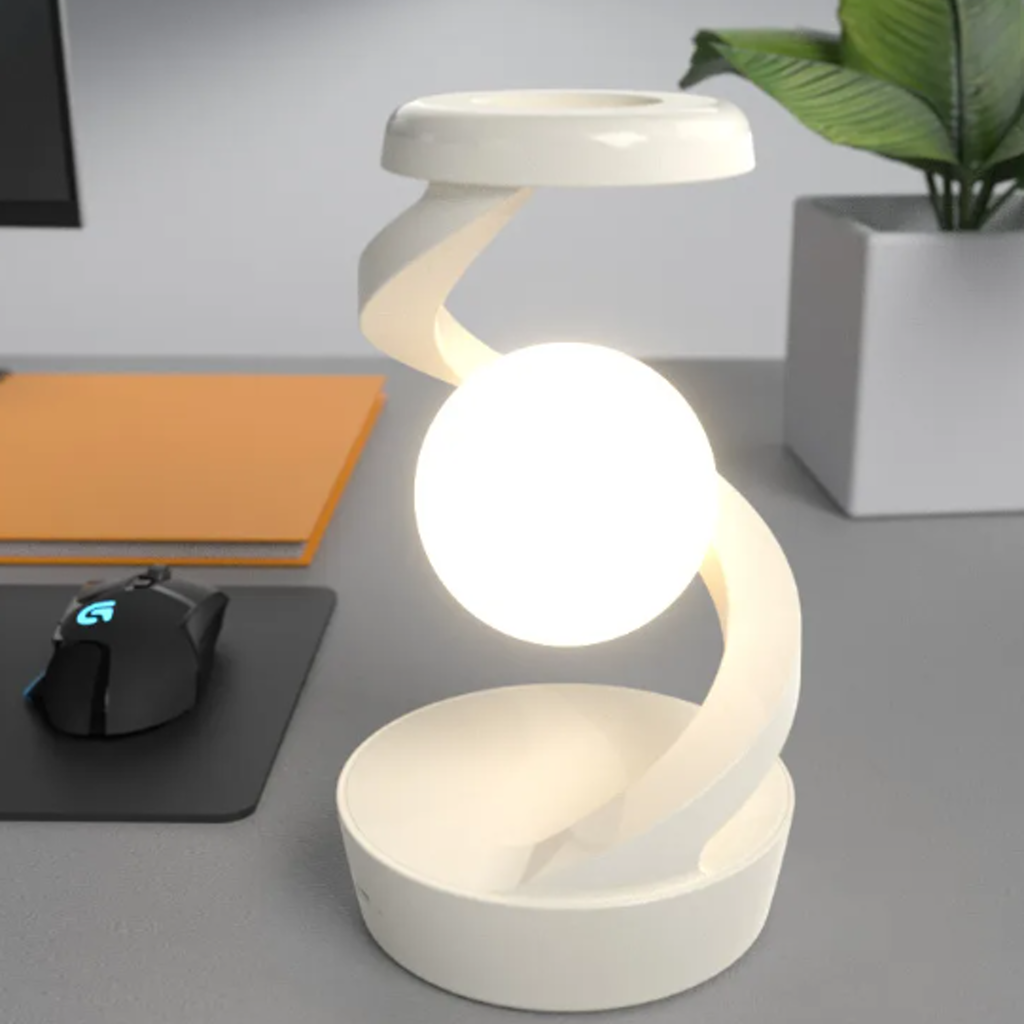 Gray Moon desk lamp in a desk setting