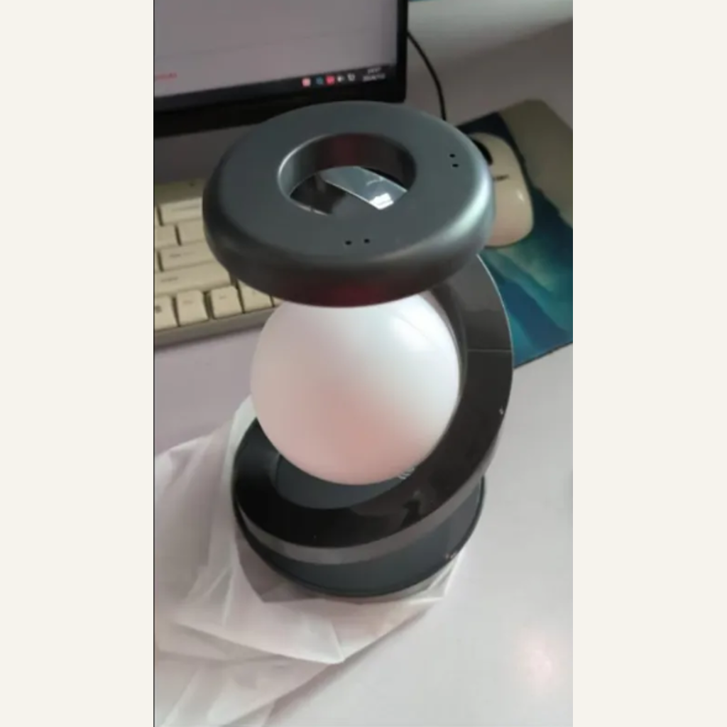 Gray Moon desk lamp physical components and levitating globe