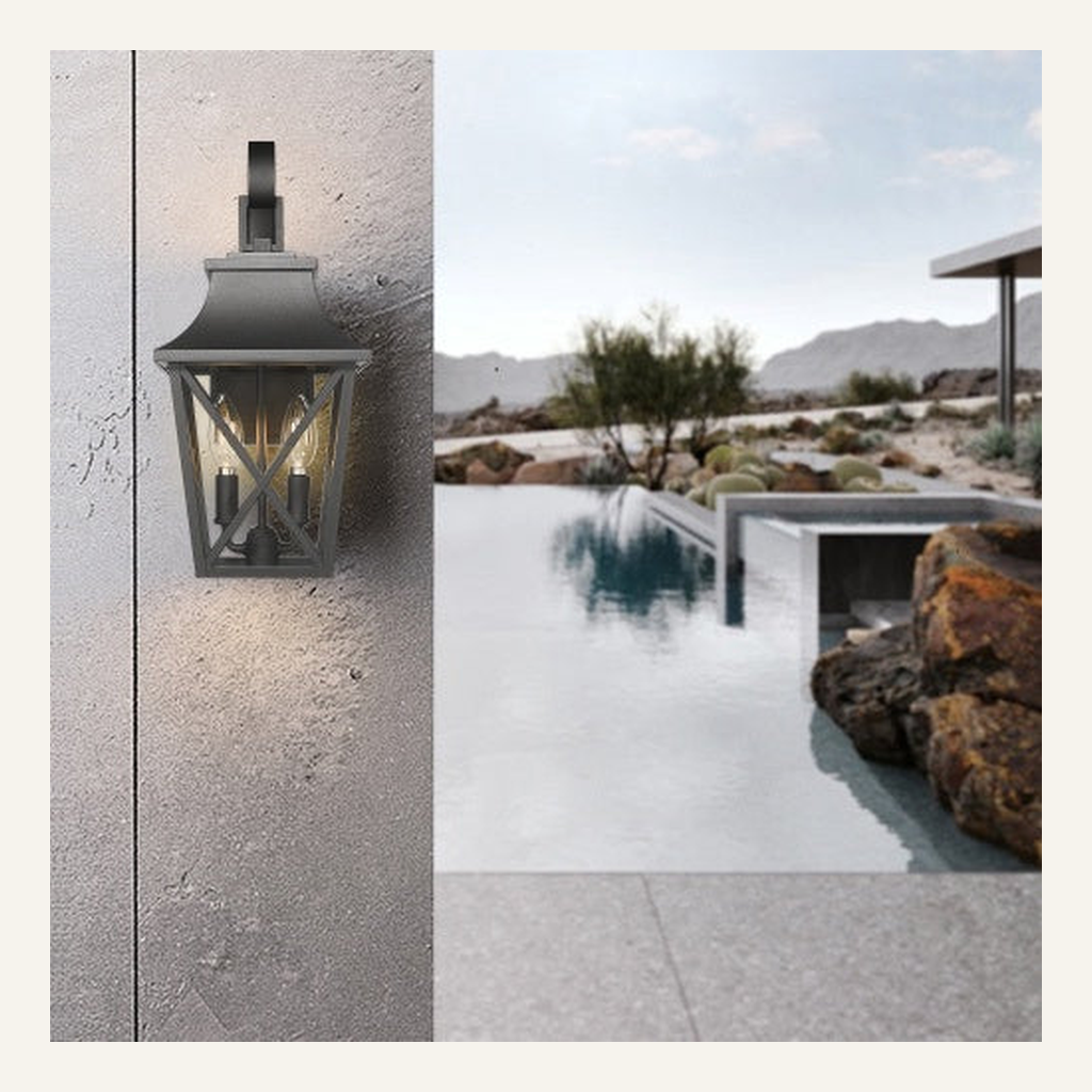 Black outdoor wall lantern installed on a stone exterior