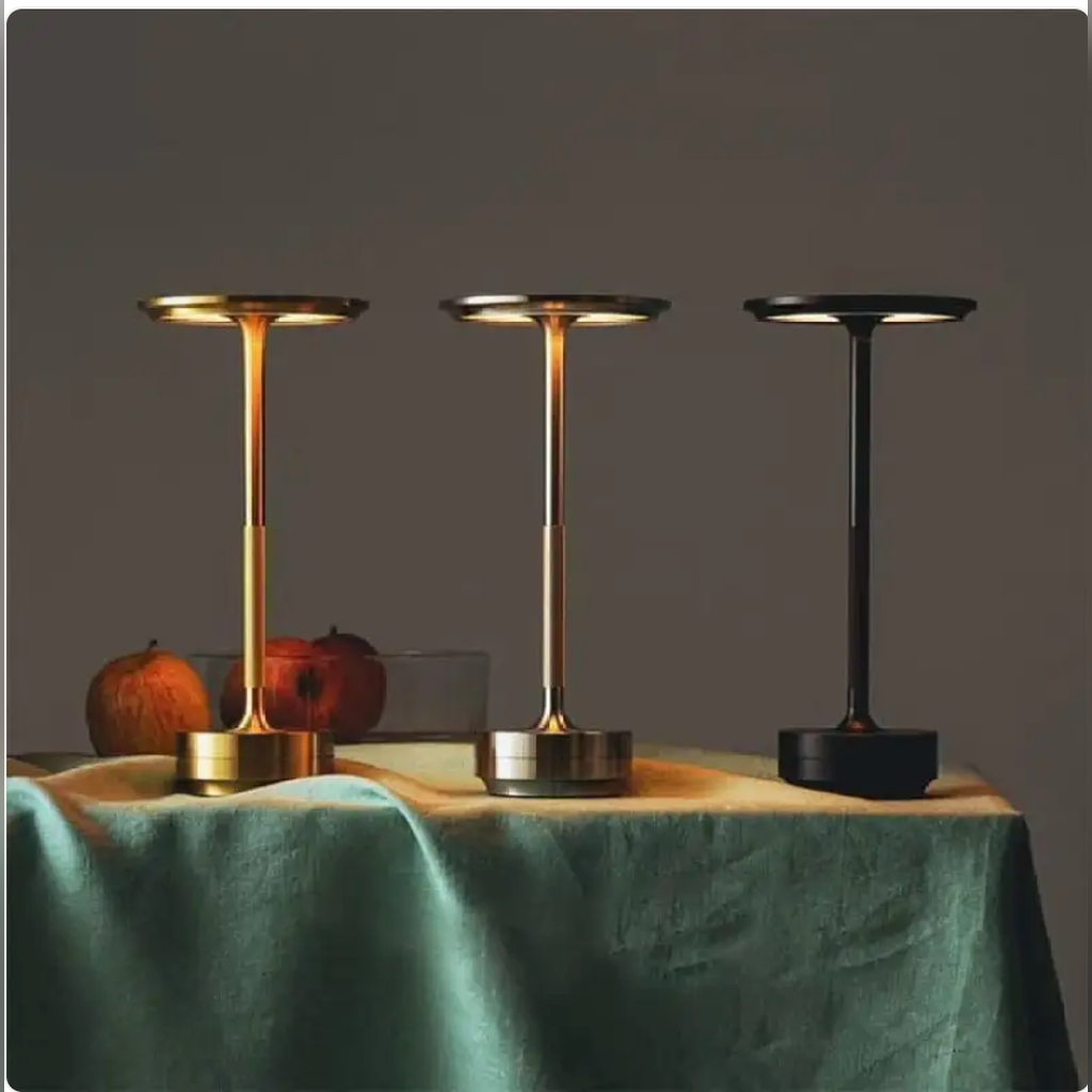 Rechargeable metal table lamp finish variants in a home setting