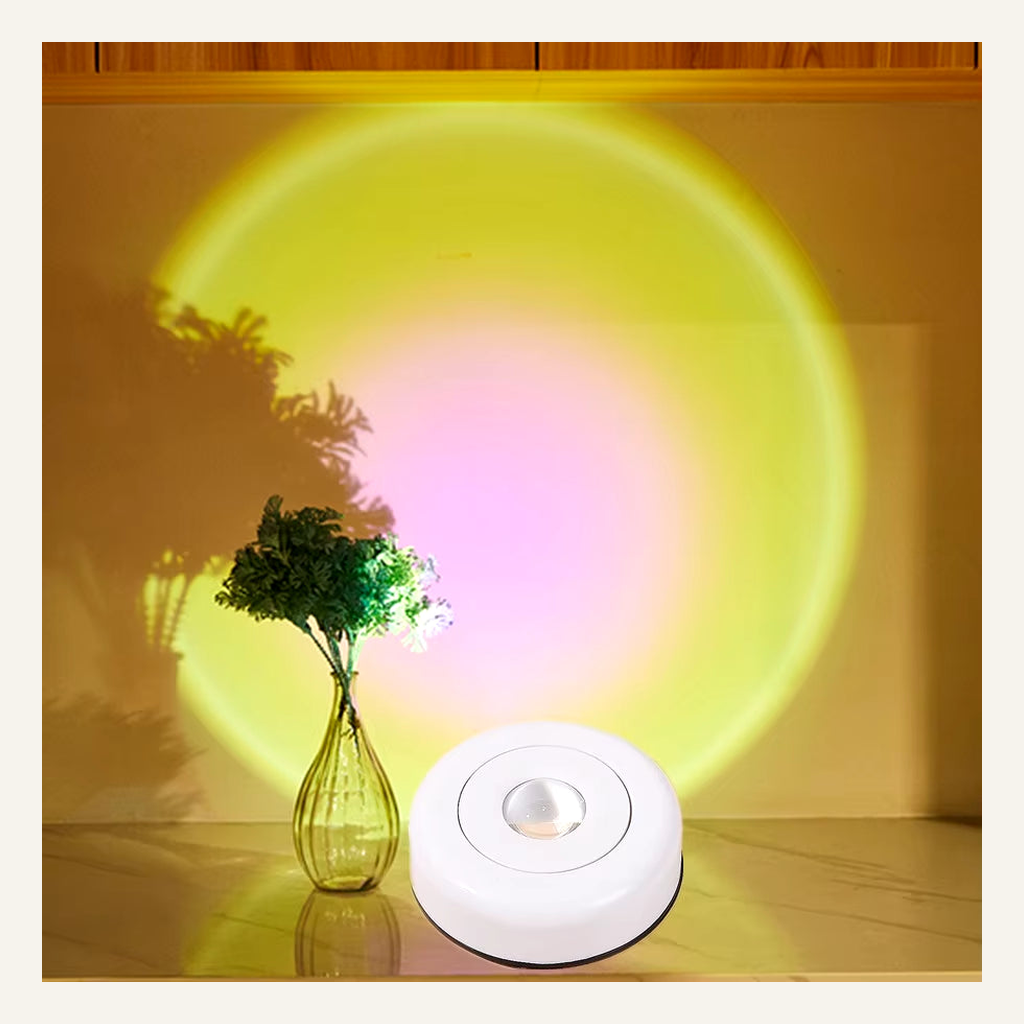 White LED accent light projecting multicolor light on a wall