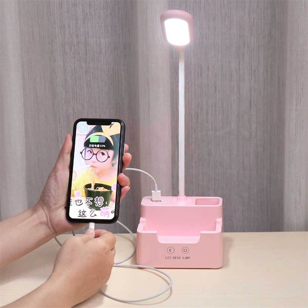 Pink LED desk lamp phone holder and power connection detail