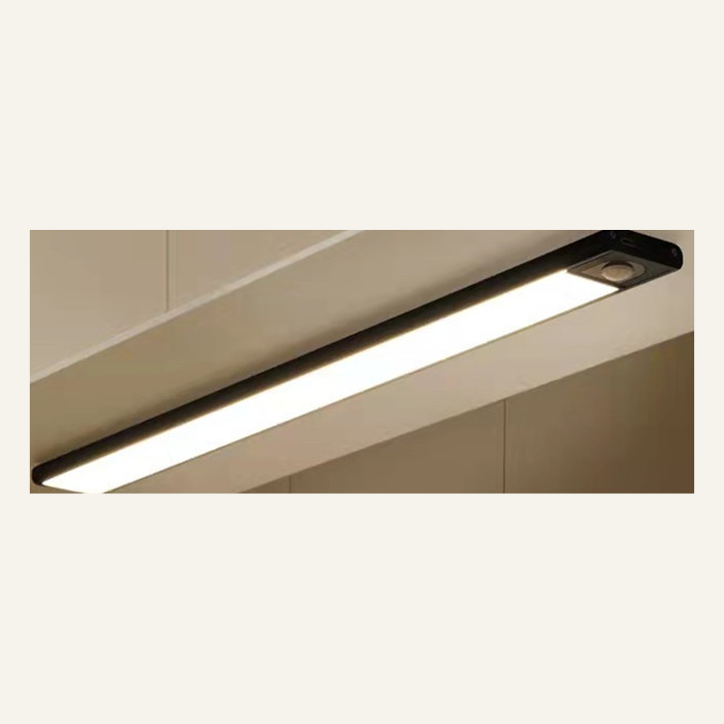Black cabinet light bar installed under a cabinet