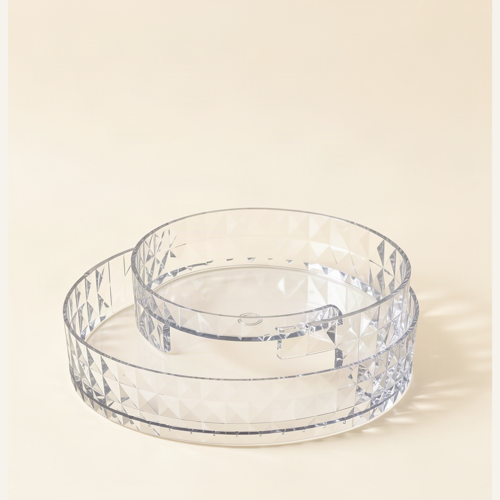 Clear rotating kitchen organizer tray on warm off-white background